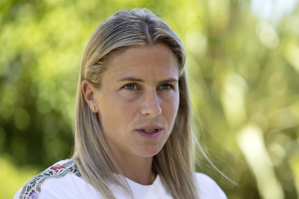Switzerland's defender Ana-Maria Crnogorcevic talks to the media in the garden of the hotel Oulton during a press conference, at the UEFA Women's Euro England 2022, in Leeds, England, Sunday ...