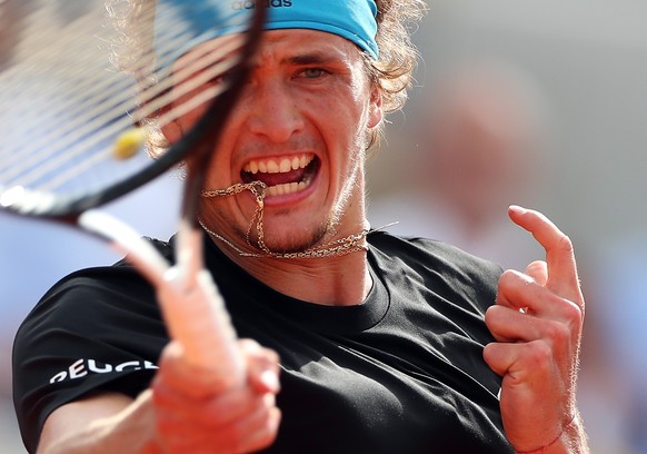 epa07622876 Alexander Zverev of Germany plays Fabio Fognini of Italy during their menâs round of 16 match during the French Open tennis tournament at Roland Garros in Paris, France, 03 June 2019. EP ...