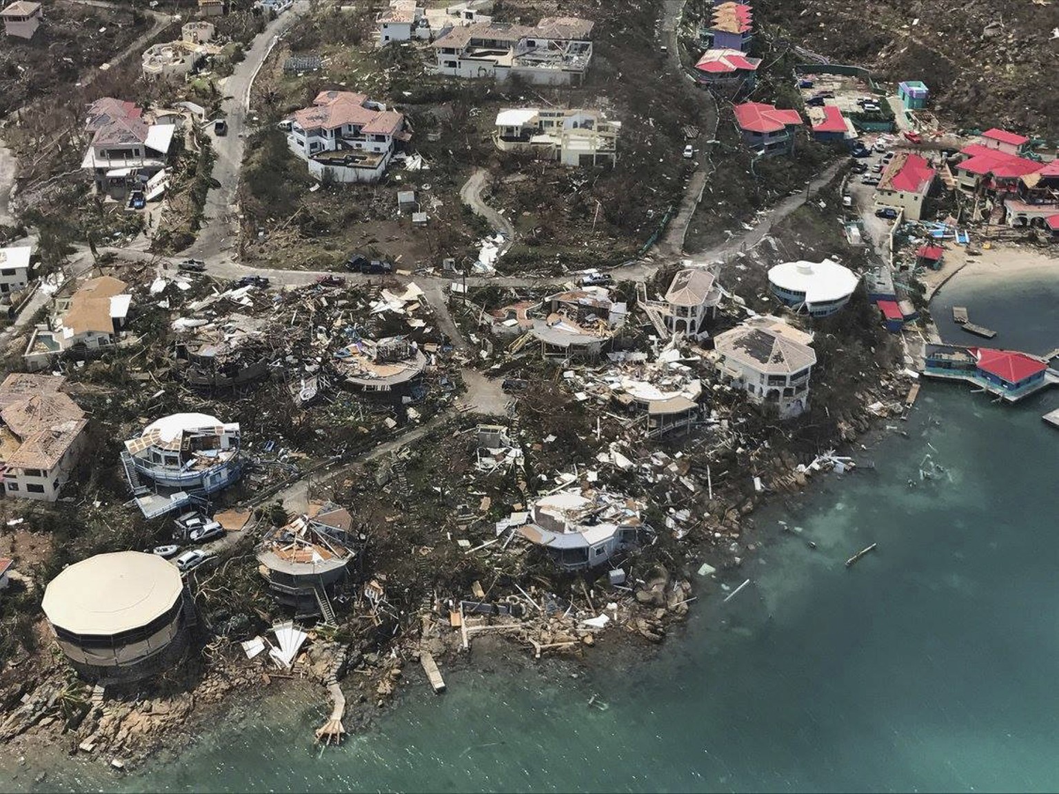 This photo provided by Caribbean Buzz shows the destruction left in the wake of Hurricane Irma Friday, Sept. 8, 2017, in the U.S. Virgin Islands The death toll from Hurricane Irma has risen to 22 as t ...