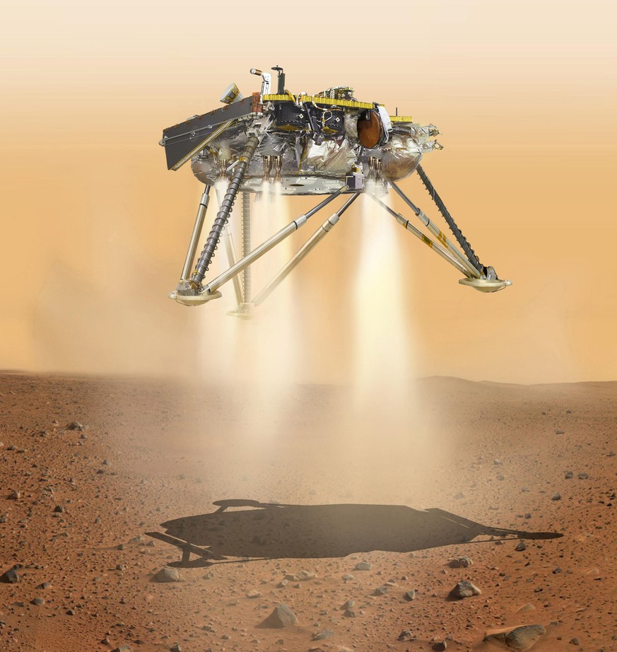 This is an illustration showing a simulated view of NASA&#039;s InSight lander about to land on the surface of Mars. This view shows the underside of the spacecraft.