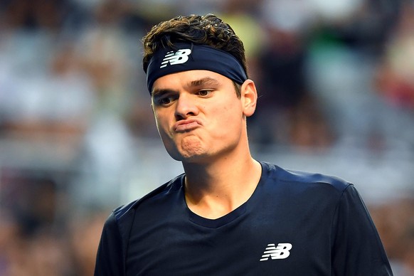 epa05737592 Milos Raonic of Canada reacts during his Men&#039;s Singles third round match against Gilles Simon of France at the Australian Open Grand Slam tennis tournament in Melbourne, Victoria, Aus ...