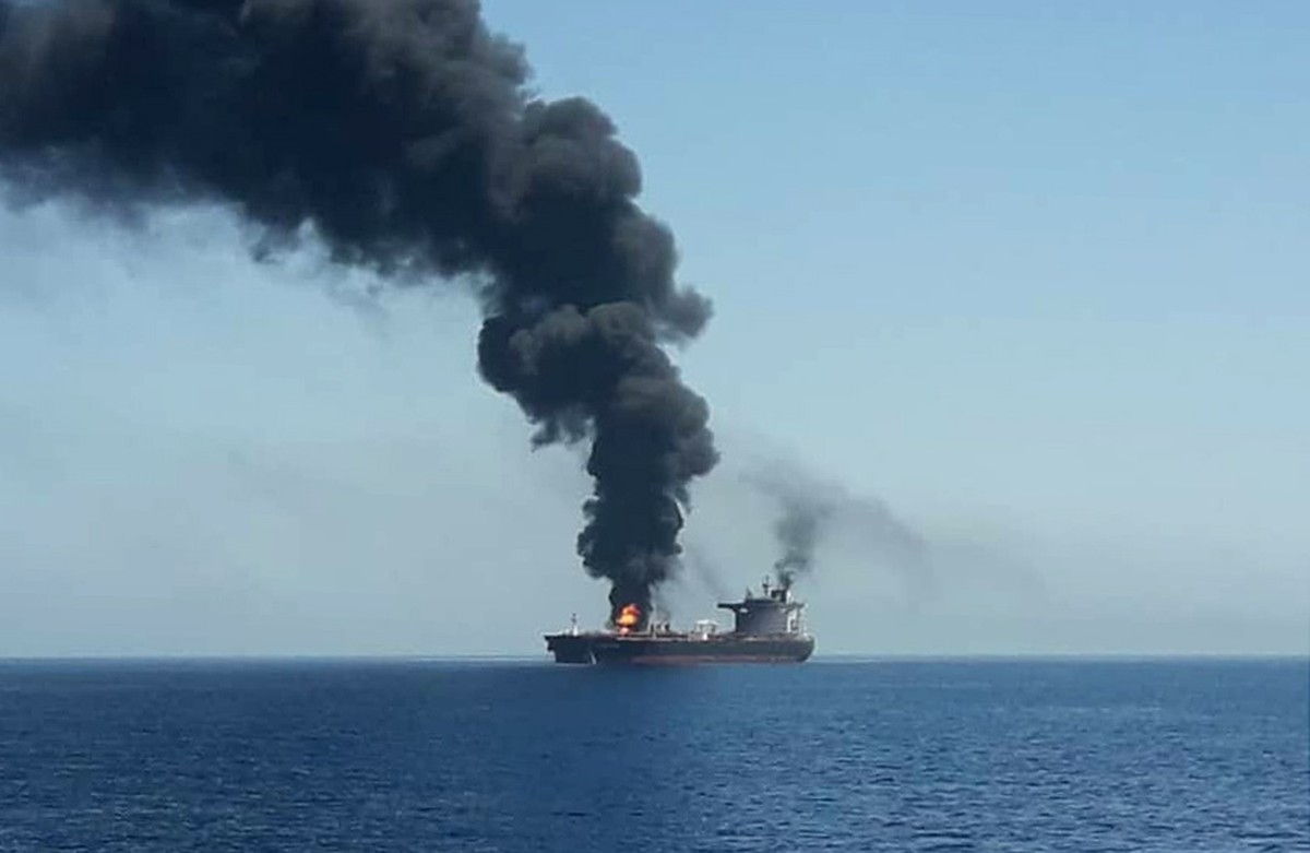 epa07645239 A handout photo made available by Iran's official state TV (IRIB) allegedly shows the crude oil tanker Front Altair on fire in the Gulf of Oman, 13 June 2019. According to the Norwegi ...