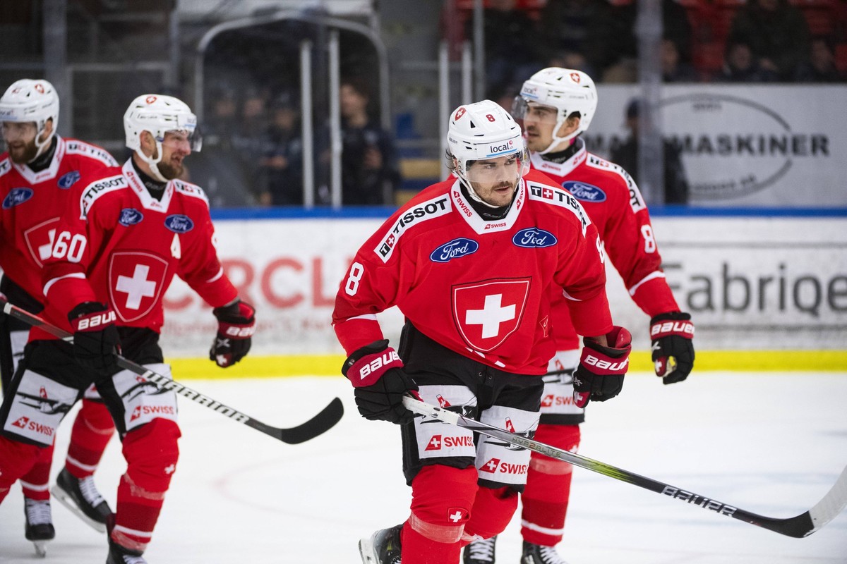 240208 Marc Marchon of Switzerland Scores during the Beijer Hockey Games between Finland and Switzerland on February 8, 2024 in Karlskoga . Photo: Jeanette Dahlstr