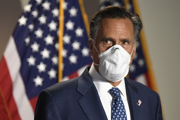 Sen. Mitt Romney, R-Utah, talks to reporters as he arrives for the weekly Republican policy luncheon on Capitol Hill in Washington, Tuesday, June 9, 2020. (AP Photo/Susan Walsh)
Mitt Romney