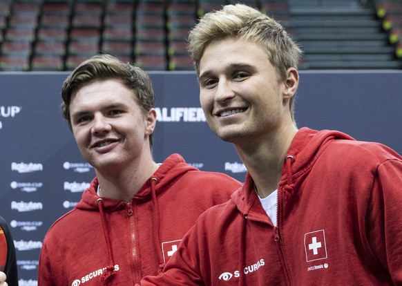 Davis Cup player Andreas Mies and Tim Puetz, of Germany, left, and Dominic Stricker and Leandro Riedi, right, of Switzerland, poses during the draw ceremony, on Thursday, February 02, 2023, at the Are ...