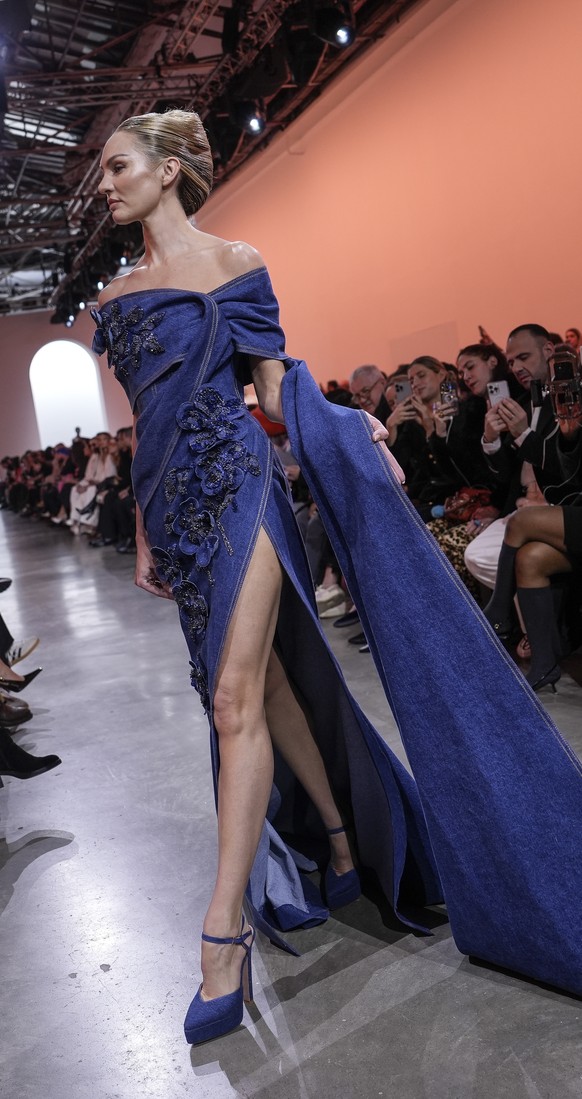 Candice Swanepoel wears a creation as part of the Elie Saab Haute Couture Spring Summer 2025 collection, that was presented in Paris, Wednesday, Jan. 29, 2025. (AP Photo/Lewis Joly).
Candice Swanepoel