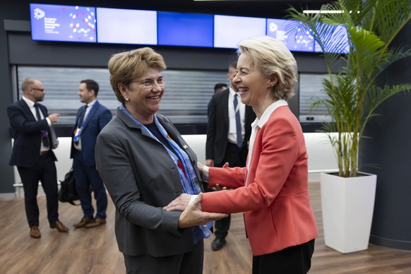 European Commission President Ursula von der Leyen, right, welcomes Swiss Federal President Viola Amherd, prior to a bilateral meeting at the European Political Community (EPC) Summit at the Puskas Ar ...
