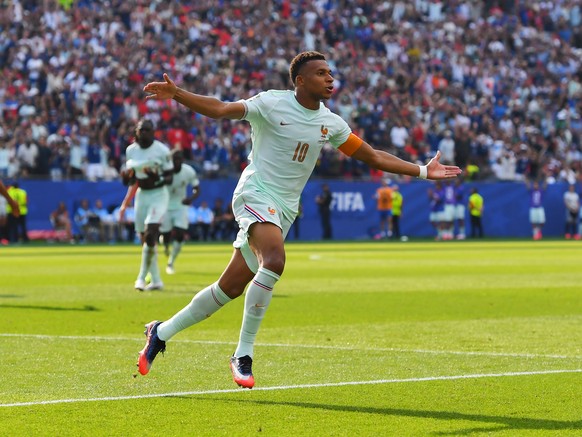 France's Kylian Mbappe (10) celebrates scoring the opening goal during the World Cup quarterfinal soccer match between France and Morocco in Foxborough, Mass., near Boston, Thursday, July 9, 2026 ...