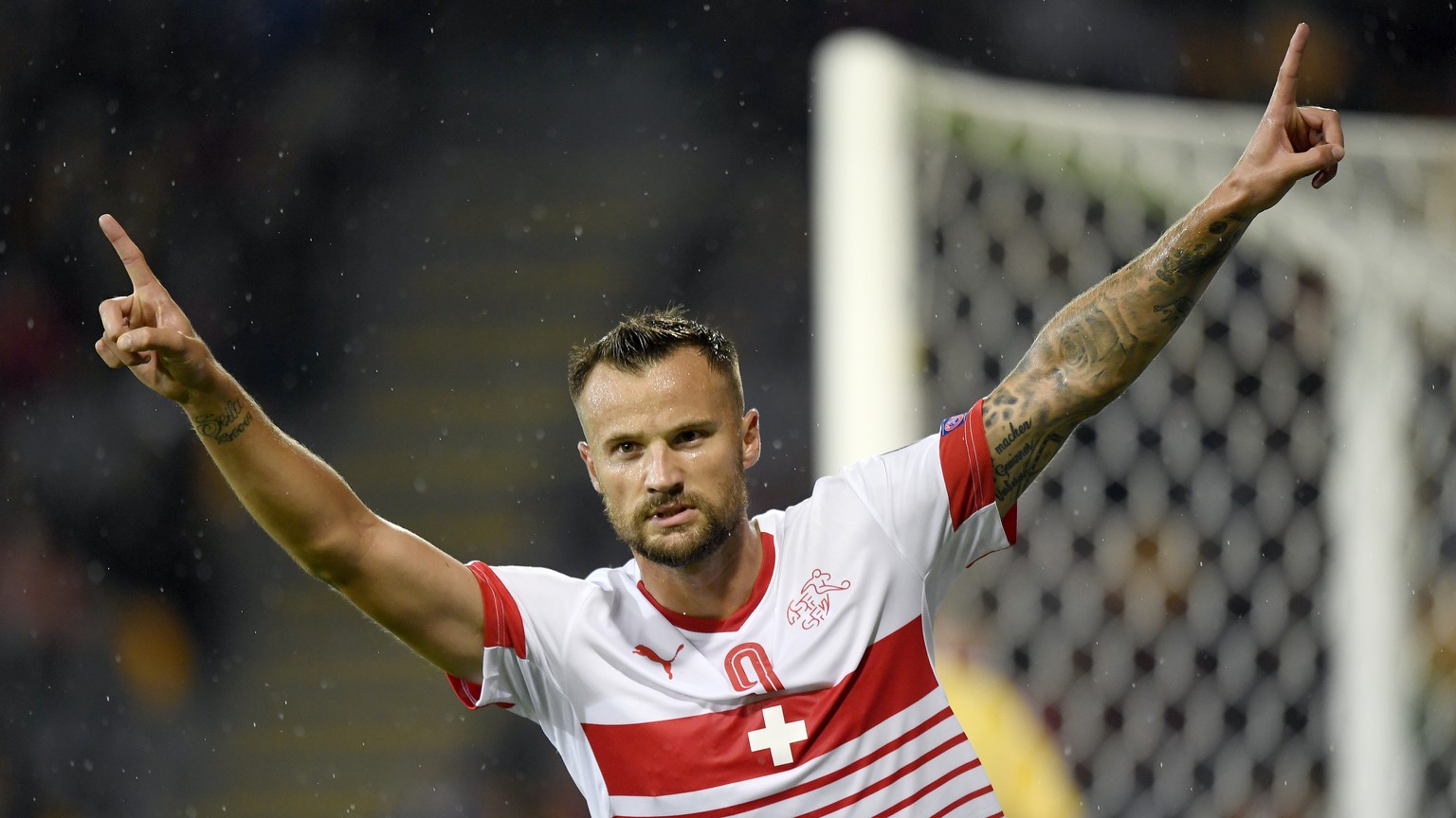 Swiss forward Haris Seferovic, celebrates after scoring the goal to the 0:1 during the 2018 Fifa World Cup group B qualifying soccer match Latvia against Switzerland at Skonto Stadium, in Riga, Latvia ...