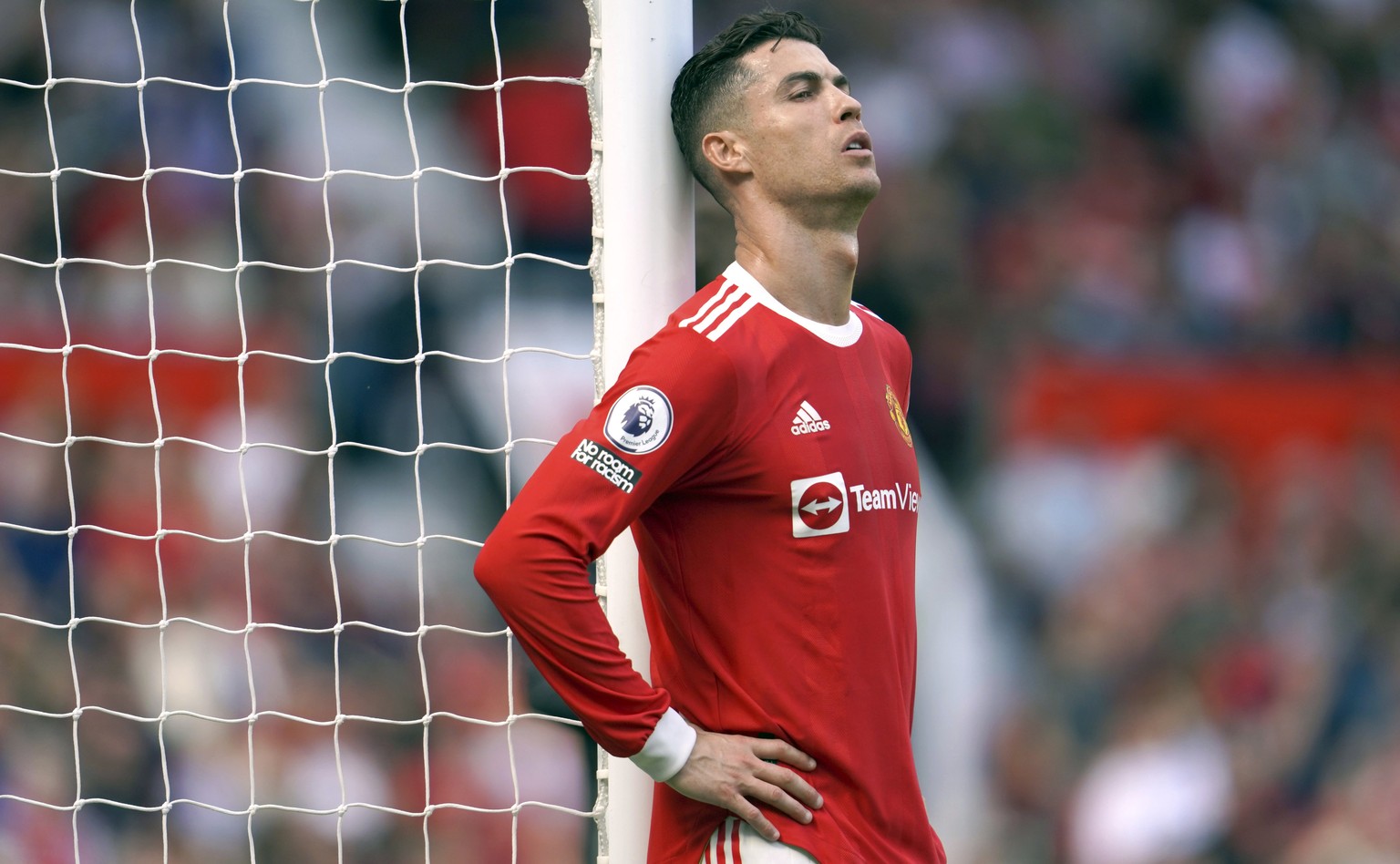 FILE- Manchester United&#039;s Cristiano Ronaldo rests against a goalpost during the English Premier League soccer match between Manchester United and Norwich City at Old Trafford stadium in Mancheste ...