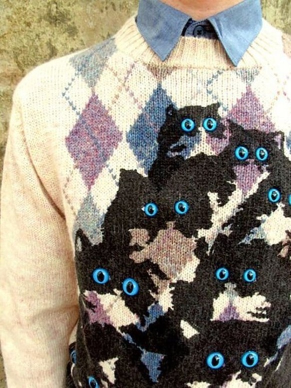 Ugly sweater with cat eyes