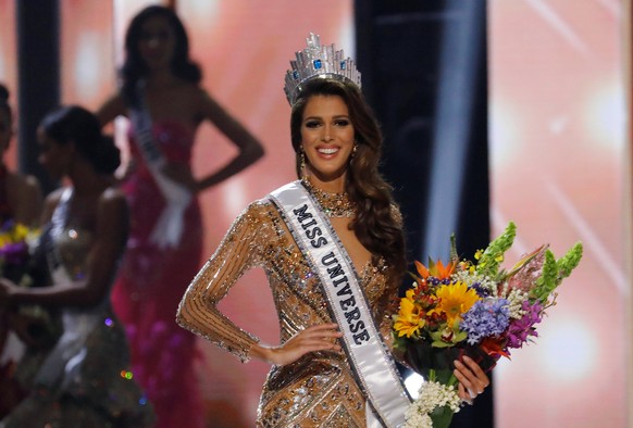 Miss France Iris Mittenaere poses after being declared winner in the 65th Miss Universe beauty pageant at the Mall of Asia Arena, in Pasay, Metro Manila, Philippines January 30, 2017. REUTERS/Erik De  ...