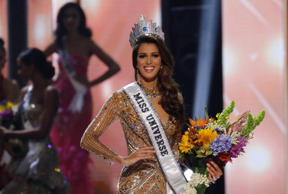 Miss France Iris Mittenaere poses after being declared winner in the 65th Miss Universe beauty pageant at the Mall of Asia Arena, in Pasay, Metro Manila, Philippines January 30, 2017. REUTERS/Erik De  ...