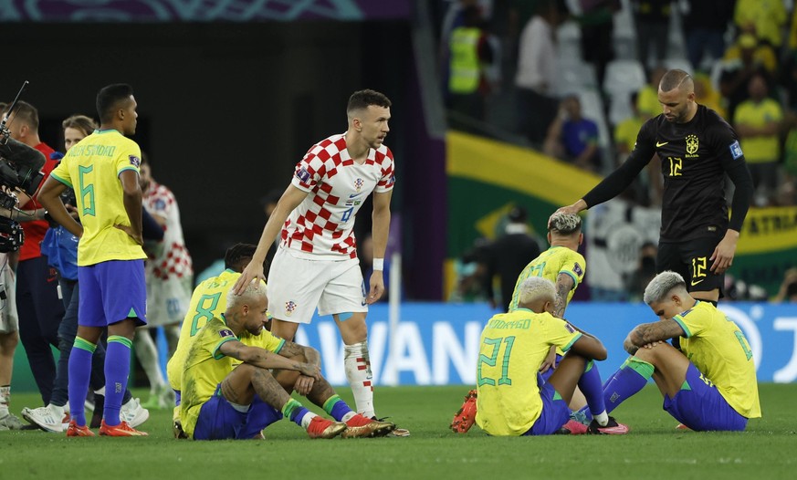 Brazilian players react to being eliminated today, in a match of the quarterfinals of the Qatar 2022 World Cup at the Education City stadium in Rayyan, Qatar 09 December 2022. Soccer World Cup 2022: C ...