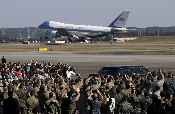 Air Force One, with U.S. President Donald Trump and first lady Melania Trump onboard, arrives at the U.S. Yokota Air Base, on the outskirts of Tokyo, Sunday, Nov. 5, 2017. President Trump arrived in J ...