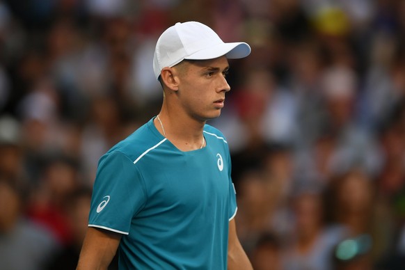 epa06442510 Alex de Minaur of Australia reacts during his first round match against Tomas Berdych of the Czech Republic at the Australian Open tennis tournament, in Melbourne, Victoria, Australia, 16  ...