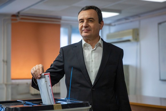 FILE - Kosovo's acting prime minister and leader of VeteVendosje political party Albin Kurti casts his ballot in Kosovo's capital Pristina, Sunday Dec. 28, 2025. (AP Photo/Visar Kryeziu, Fil ...