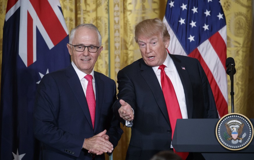 epa06559011 US President Donald J. Trump (R) and Prime Minister of Australia Malcolm Turnbull (L) walk from the stage following a joint press conference in the East Room of the White House in Washingt ...