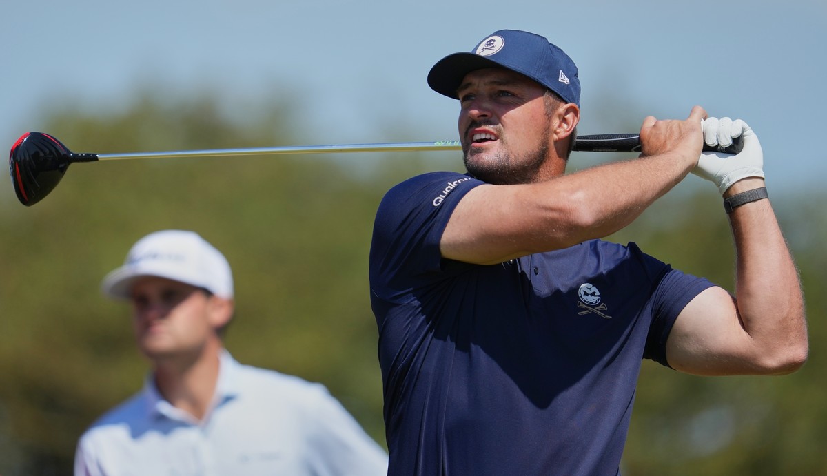 Bryson DeChambeau of the United States drives off the 2nd tee during the final day of the British Open Golf championships at Royal Birkdale golf club, in Southport, England, Sunday, July 19, 2026. (AP ...