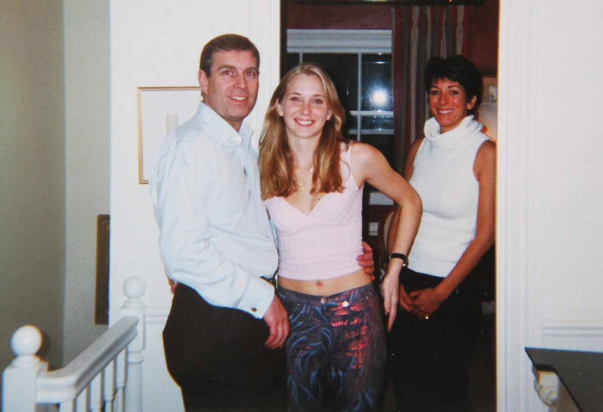 Prince Andrew and Virginia Roberts Prince Andrew smiling as he stands with his left arm around the waist of a young Virginia Roberts now Virginia Giuffre. It is alleged to have been taken in early 200 ...