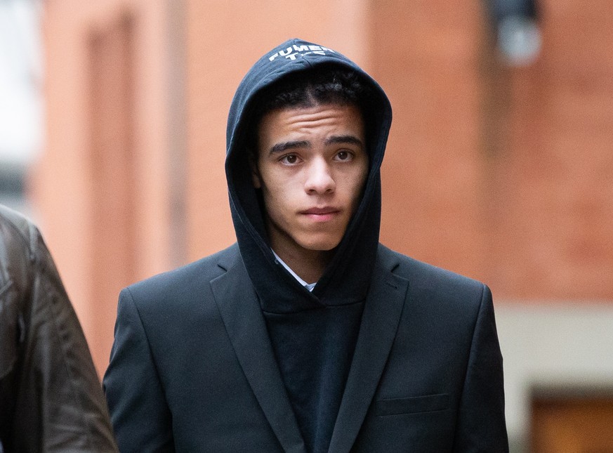 epa10317515 Manchester United footballer Mason Greenwood leaves Manchester Crown Court in Manchester, Britain, 21 November 2022. The player was re-bailed until next hearing session on 10 February 2023 ...