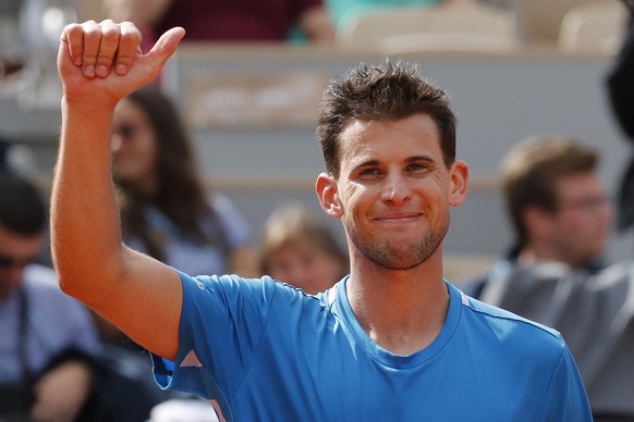 Austria&#039;s Dominic Thiem celebrates winning his fourth round match of the French Open tennis tournament against France&#039;s Gael Monfils in three sets, 6-4, 6-4, 6-2, at the Roland Garros stadiu ...
