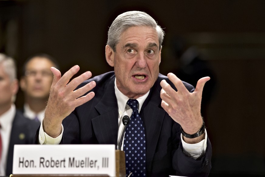 FILE - In this June 19, 2013, file photo, then-FBI Director Robert Mueller testifies on Capitol Hill in Washington. When special counsel Mueller testifies before Congress it will be a moment many have ...