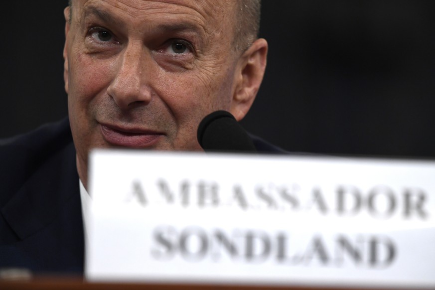 U.S. Ambassador to the European Union Gordon Sondland testifies before the House Intelligence Committee on Capitol Hill in Washington, Wednesday, Nov. 20, 2019, during a public impeachment hearing of  ...