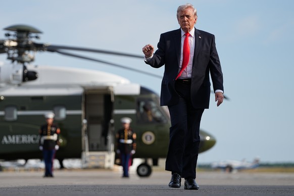 President Donald Trump walks from Marine One to board Air Force One at Ocala International Airport, in Ocala Fla., Friday, May 1, 2026, after speaking at an event in The Villages, Fla. (AP Photo/Matt  ...