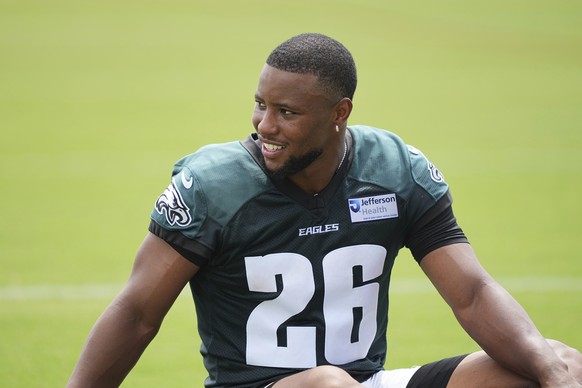 Philadelphia Eagles running back Saquon Barkley speaks waits for his turn to speak at a news conference during the team?s NFL football training camp, Wednesday, July 23, 2025, in Philadelphia. (AP Pho ...