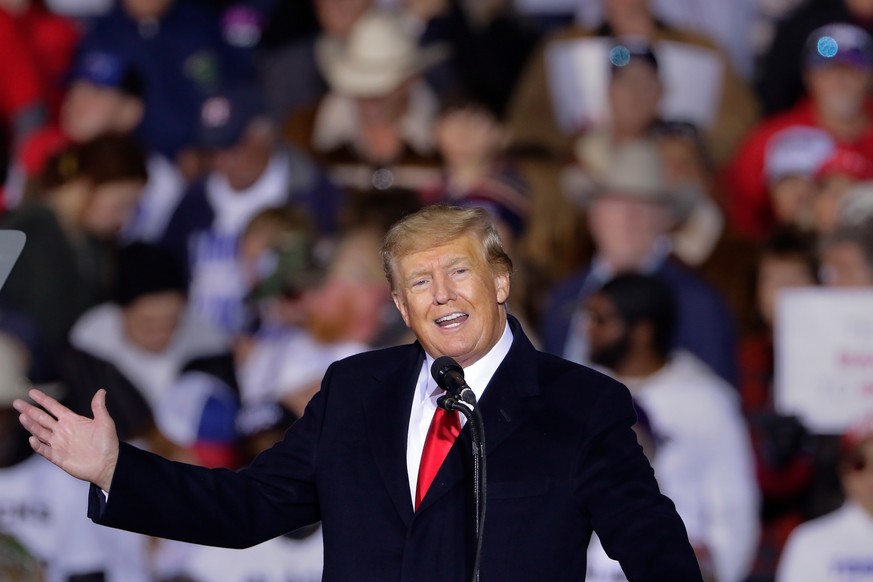 epa09717400 Former US president Donald Trump speaks at a Save America Rally, held outdoors at the Montgomery County Fairgrounds in Conroe, Texas, USA, 29 January 2022. Trump has been holding rallies a ...