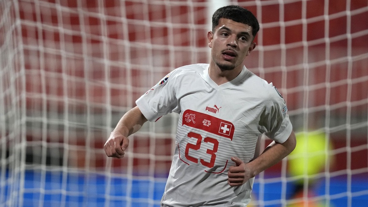 Switzerland's Zeki Amdouni celebrates after scoring his side's fifth goal during the Euro 2024 Group I qualifying soccer match between Belarus and Switzerland at the Karadjordje Stadium in N ...