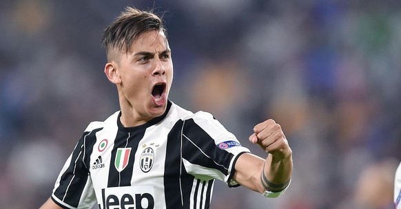 epa05903416 Juventus&#039; Paulo Dybala jubilates after scoring a goal during the UEFA Champions League quarter final first leg soccer match between Juventus FC and FC Barcelona at Juventus Stadium in ...