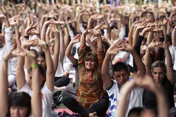 Attendants stretch during a Yoga for Peace event led by India&#039;s Prime Minister Narendra Modi at La Rural Convention Center in Buenos Aires, Argentina, Thursday, Nov. 29, 2018. Modi and other lead ...