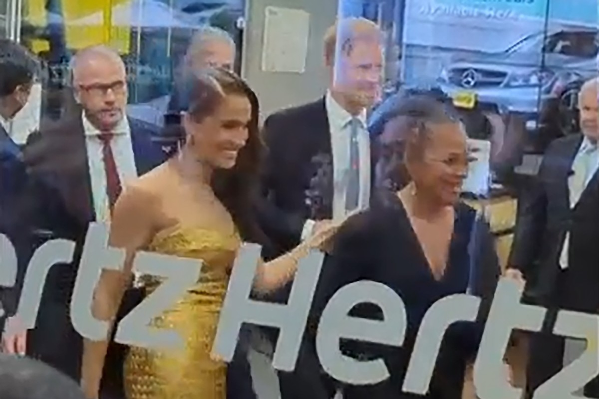 Prince Harry and his wife Meghan Markle arrive at venue prior to car incident, Tuesday, May 16, 2023, in New York. The couple's office says the pair and Meghan's mother were followed by vehi ...