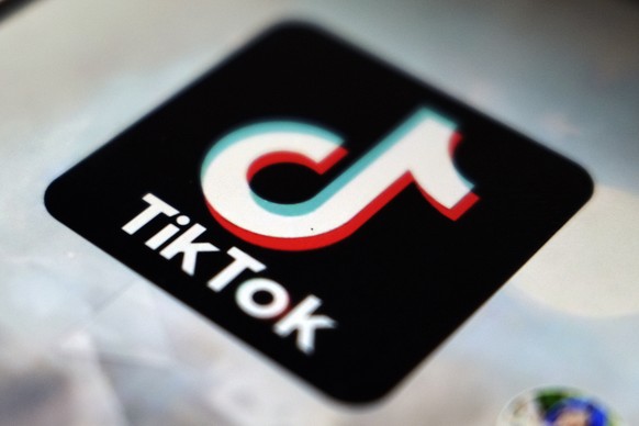 FILE - In this Sept. 28, 2020, file photo, The TikTok app logo appears in Tokyo. State attorneys general have launched a nationwide investigation into TikTok and its possible harmful effects on young  ...