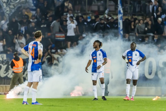 Lovro Zvoranek (GC), left, Imourane Hassane (GC), centre, and El Bachir Ngom (GC), right, reacts after conceding the 2:0, during the Swiss Cup semifinal between FC Stade Lausanne-Ouchy, SLO, and Grass ...