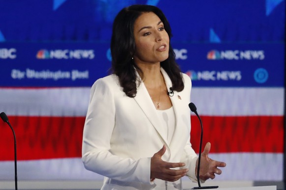 Democratic presidential candidate Rep. Tulsi Gabbard, D-Hawaii, speaks during a Democratic presidential primary debate, Wednesday, Nov. 20, 2019, in Atlanta. (AP Photo/John Bazemore)