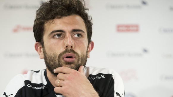 epa06002048 Swiss midfielder Admir Mehmedi speaks during a press conference of the Swiss soccer national team at the Stadium Maladiere in Neuchatel, Switzerland, 31 May 2017. Switzerland will face Bel ...