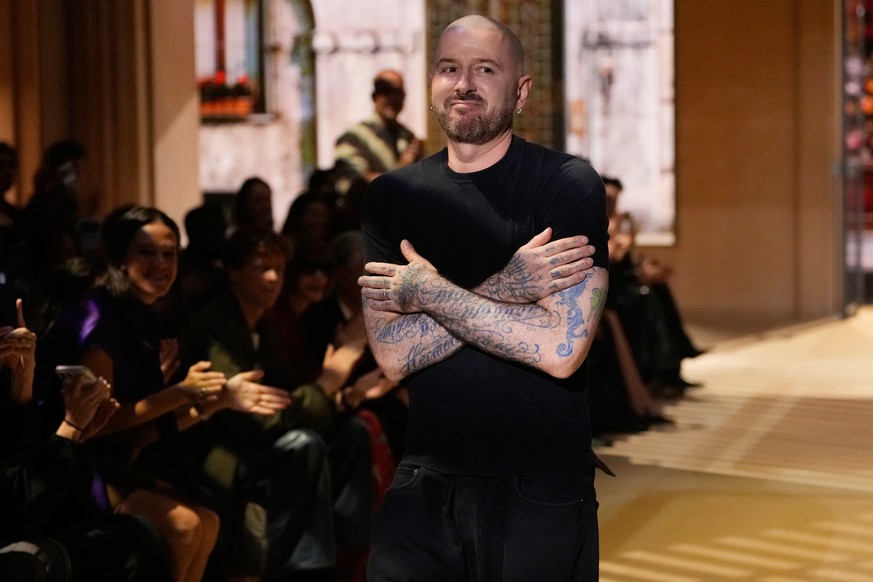 Demna Gvasalia accepts applause at the end of the Gucci women's Spring-Summer 2027 fashion show, presented in Milan, Italy, Friday, Sept. 25, 2026. (AP Photo/Luca Bruno)
Demna Gvasalia