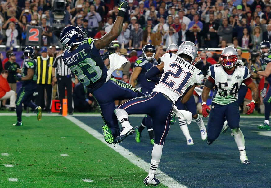 Die Entscheidung: Patriots-Verteidiger Butler (21) fängt einen Pass vor Lockette (83) und verhindert einen Touchdown der Seahawks.