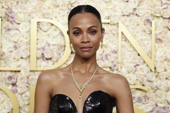 Zoe Saldana arrives at the 82nd Golden Globes on Sunday, Jan. 5, 2025, at the Beverly Hilton in Beverly Hills, Calif. (Photo by Jordan Strauss/Invision/AP)
Zoe Saldana