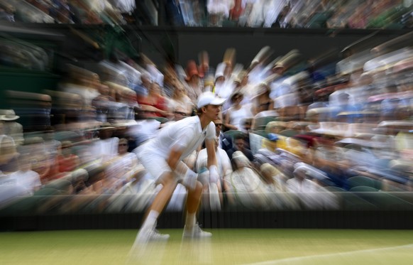 epa06885730 Kevin Anderson of South Africa plays John Isner of the US in their semi final match during the Wimbledon Championships at the All England Lawn Tennis Club, in London, Britain, 13 July 2018 ...