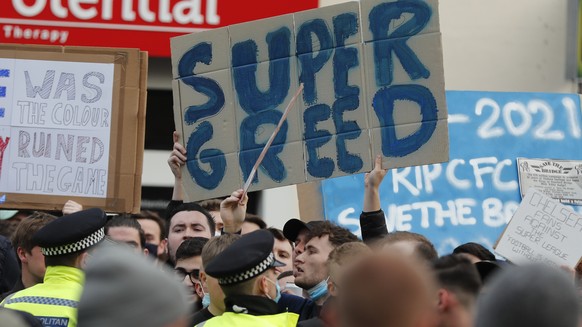 Chelsea fans protest against Chelsea&#039;s decision to be included amongst the clubs attempting to form a new European Super League before the English Premier League soccer match between Chelsea and  ...