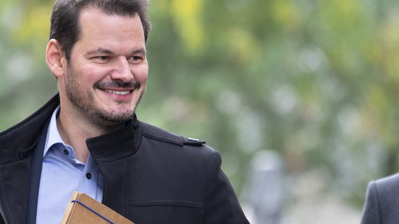 Pierre Maudet, ancien conseiller d&#039;Etat genevois, arrive au palais de justice pour la deuxieme journee de son proces devant la Chambre penale d&#039;appel et de revision de Geneve, ce mardi 12 oc ...