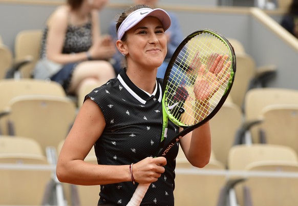 epa07612381 Belinda Bencic of Switzerland reacts after winning against Laura Siegemund of Germany their women’s second round match during the French Open tennis tournament at Roland Garros in Paris, F ...