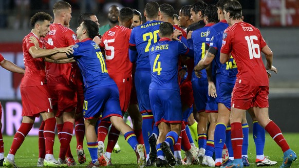 Switzerland&#039;s midfielder Ruben Vargas, left, argues with Andorra&#039;s forward Ricard Fernandez, 2nd left, behind other players who argue too, during the UEFA Euro 2024 qualifying group I soccer ...