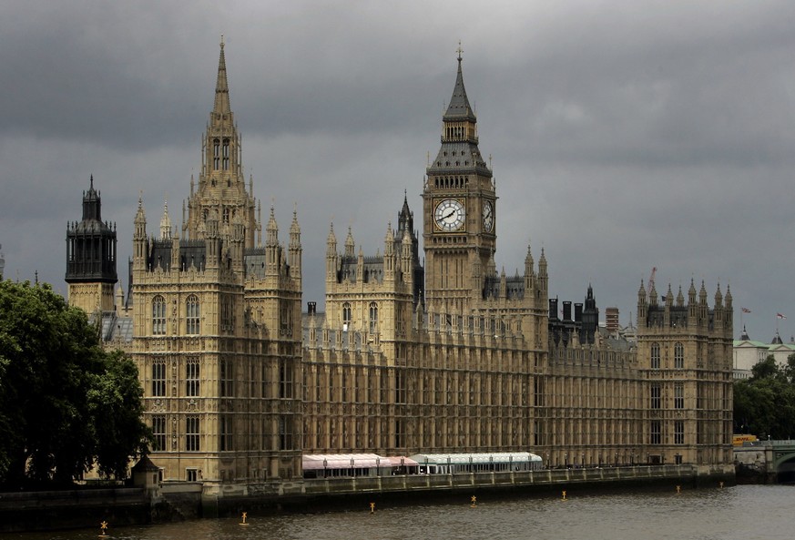 FILE - This Thursday, July 26, 2007 file photo shows a general view of the Houses of Parliament on the river Thames in London. British Prime Minister Boris Johnson asked Queen Elizabeth II on Wednesda ...