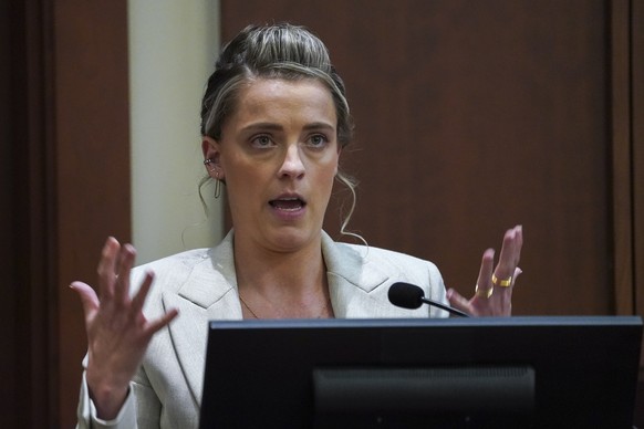 Whitney Henriquez, sister of actress Amber Heard testifies at the Fairfax County Circuit Courthouse in Fairfax, Va., Wednesday, May 18, 2022. Actor Johnny Depp sued his ex-wife Amber Heard for libel i ...