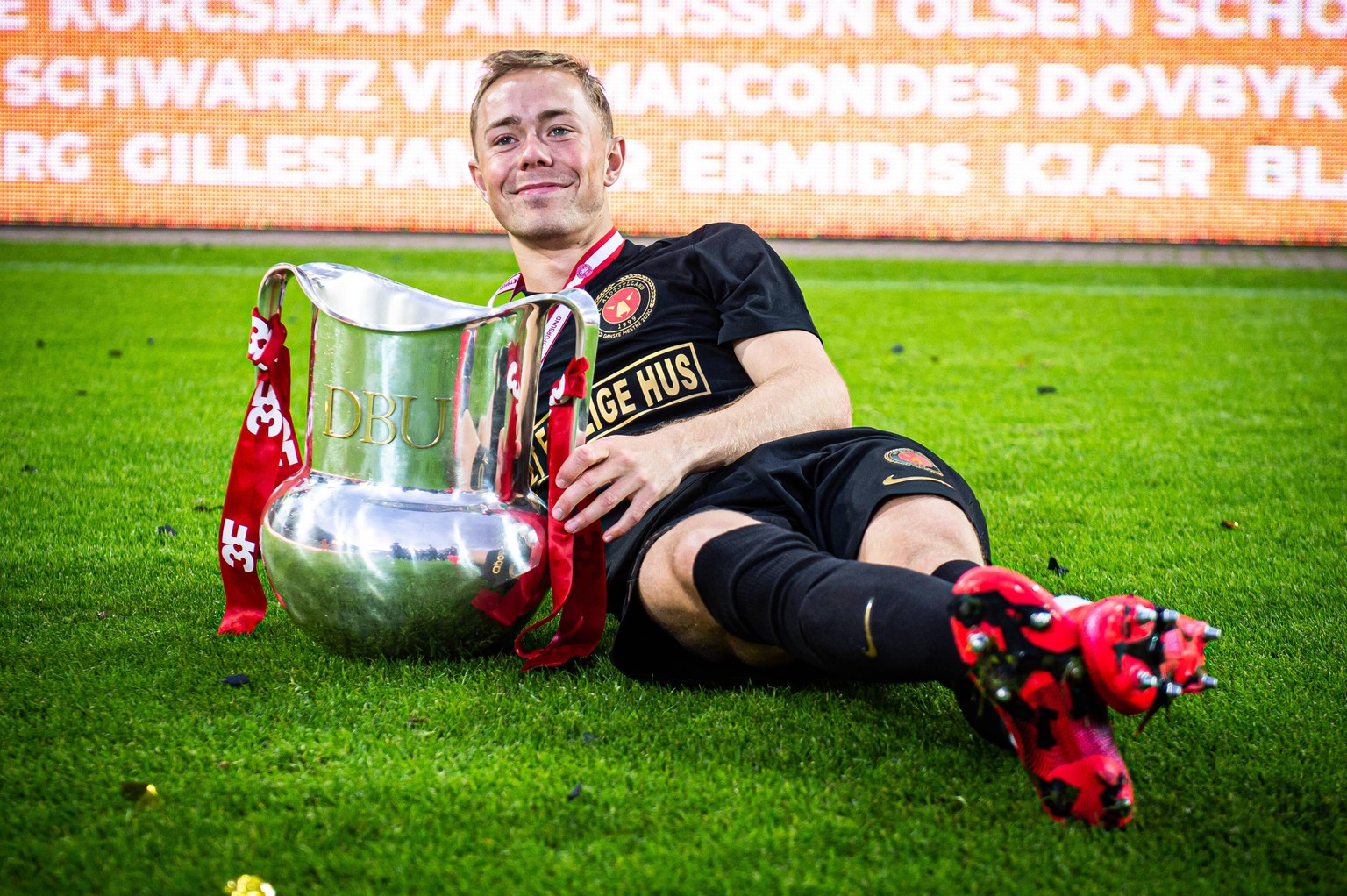 Herning, Denmark, 26th, July 2020. Joel Andersson of FC Midtjylland is celebrating as the 2019-2020 winner of the 3F Superliga after the match between FC Midtjylland and AAB at MCH Arena in Herning. P ...